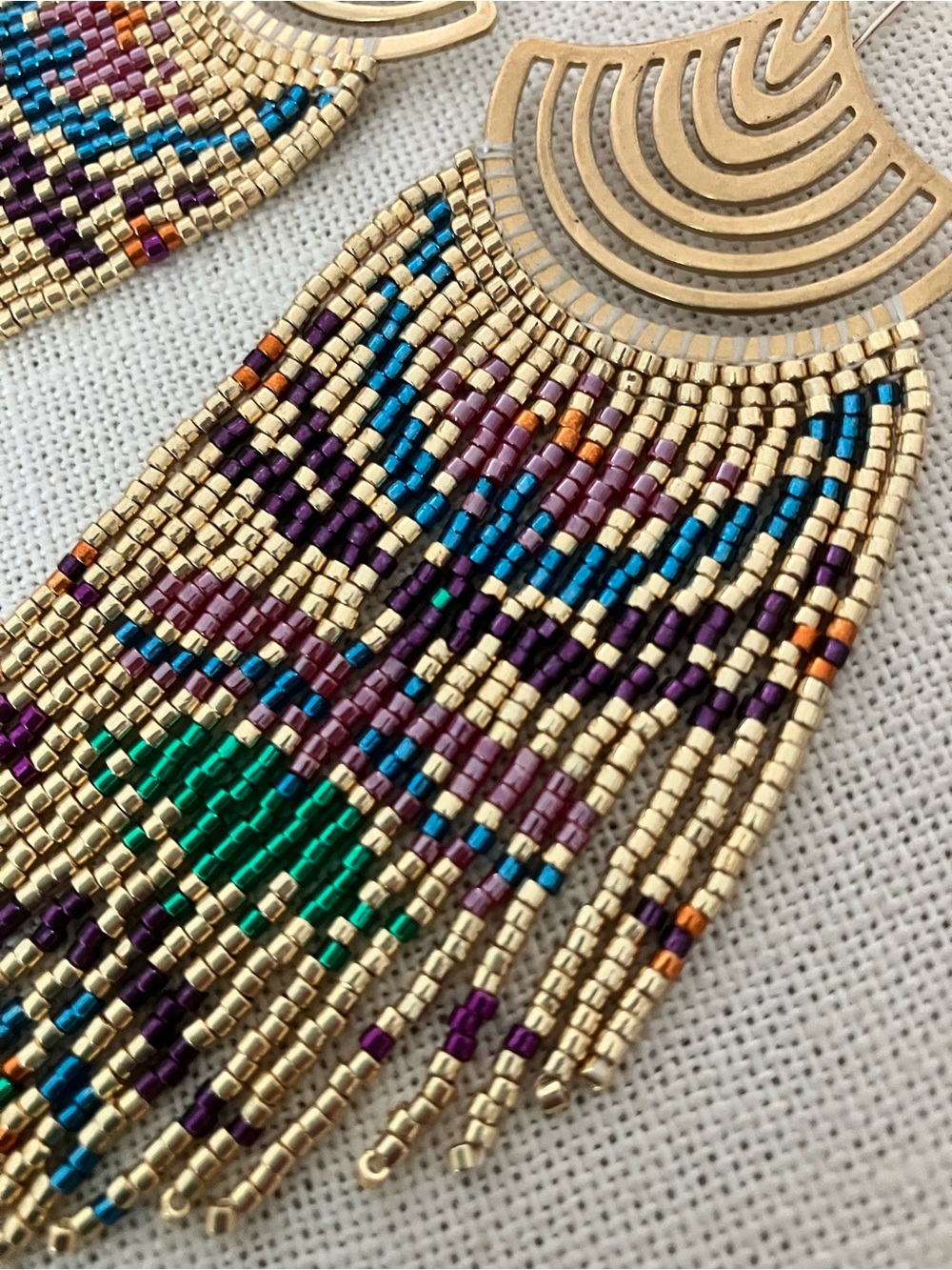 Metallic folk pattern fringe earrings